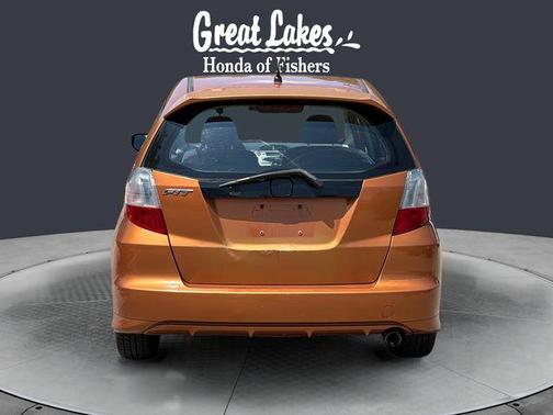 Orange Revolution Metallic 2011 Honda Fit Sport