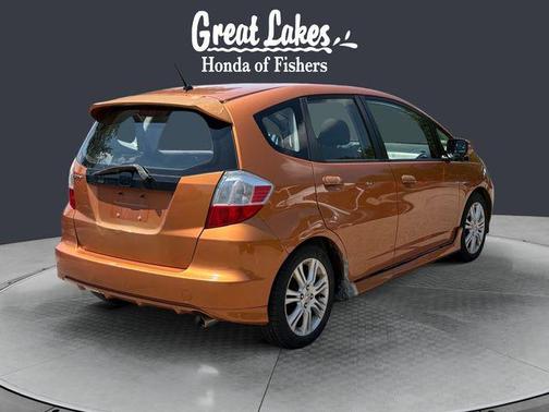 Orange Revolution Metallic 2011 Honda Fit Sport