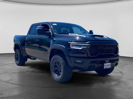 Diamond Black Crystal Pearlcoat 2026 RAM 1500 RHO Crew Cab 4x4 5'7' Box