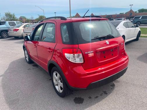 Red 2011 Suzuki SX4 Base