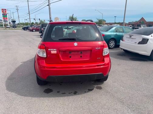 Red 2011 Suzuki SX4 Base