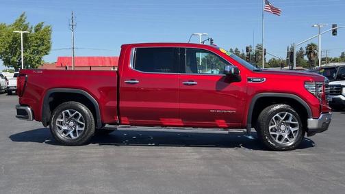 Volcanic Red Tintcoat 2026 GMC Sierra 1500 SLT