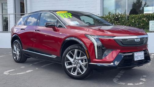 Radiant Red Tintcoat 2026 Cadillac OPTIQ Luxury