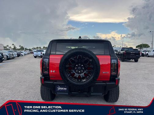 Solar Orange 2026 GMC HUMMER EV SUV 2X