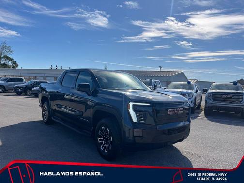 Deep Ocean Metallic 2026 GMC Sierra EV Extended Range Elevation