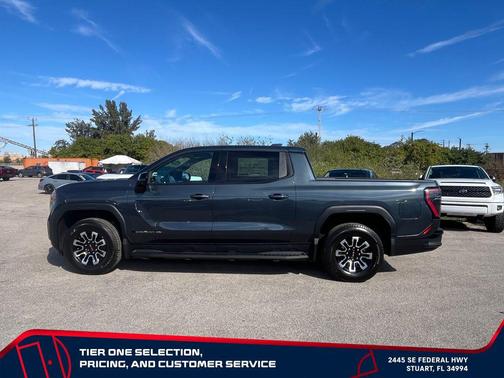 Deep Ocean Metallic 2026 GMC Sierra EV Extended Range Elevation