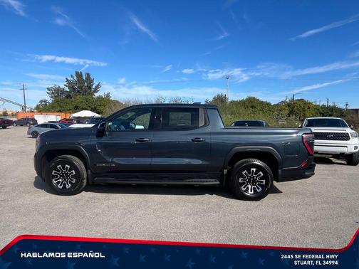 Deep Ocean Metallic 2026 GMC Sierra EV Extended Range Elevation
