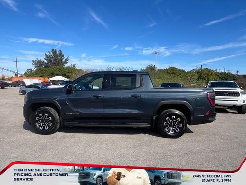 Deep Ocean Metallic 2026 GMC Sierra EV Extended Range Elevation