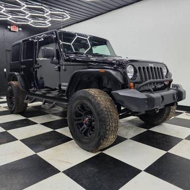 Black Clearcoat 2012 Jeep Wrangler Unlimited Sport