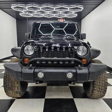 Black Clearcoat 2012 Jeep Wrangler Unlimited Sport