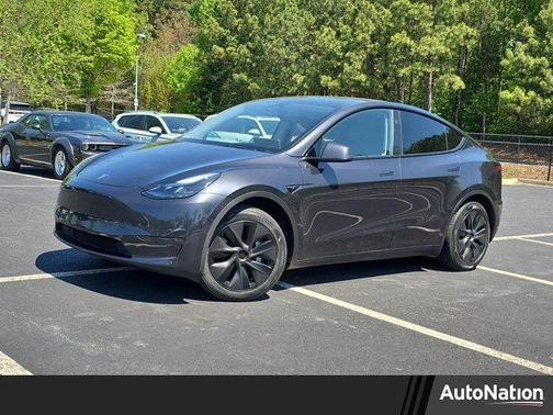 Silver 2025 Tesla Model Y Long Range Dual Motor Rear-Wheel Drive