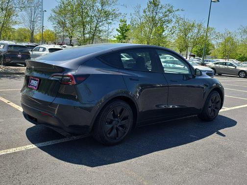Silver 2025 Tesla Model Y Long Range Dual Motor Rear-Wheel Drive