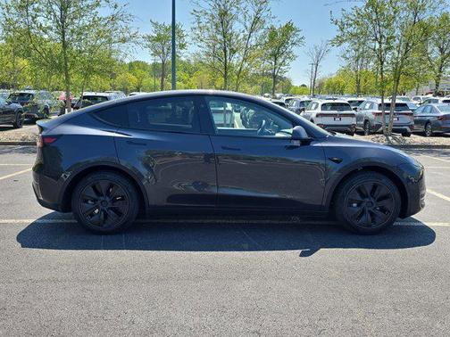 Silver 2025 Tesla Model Y Long Range Dual Motor Rear-Wheel Drive