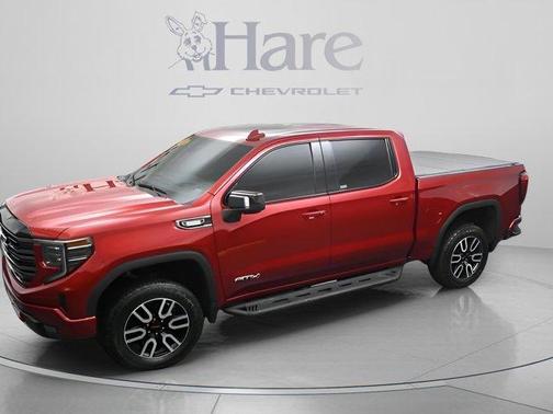 Volcanic Red 2025 GMC Sierra 1500 AT4