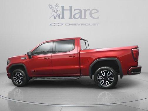 Volcanic Red 2025 GMC Sierra 1500 AT4