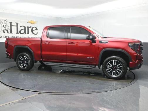 Volcanic Red 2025 GMC Sierra 1500 AT4