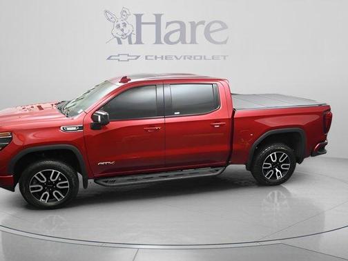 Volcanic Red 2025 GMC Sierra 1500 AT4