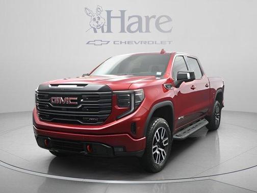 Volcanic Red 2025 GMC Sierra 1500 AT4