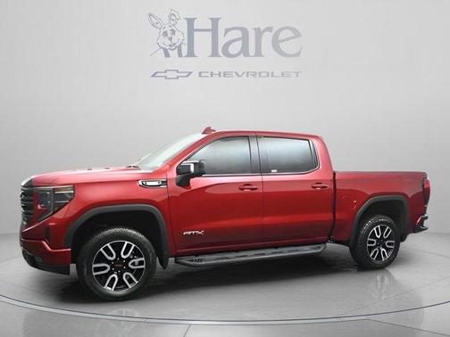 Volcanic Red 2025 GMC Sierra 1500 AT4