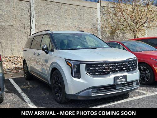 Ivory Silver 2025 Kia Carnival SX Prestige