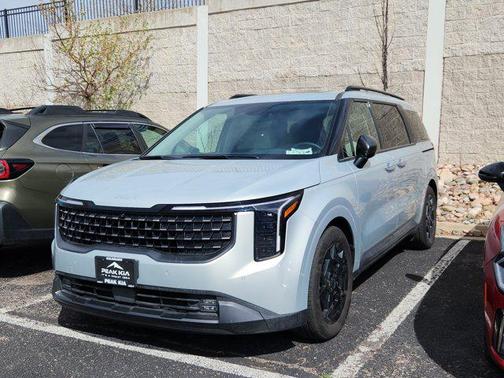 Ivory Silver 2025 Kia Carnival SX Prestige