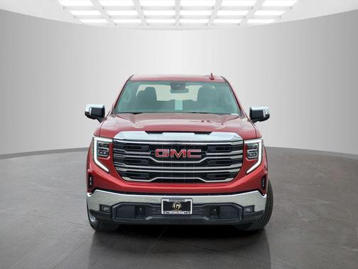 Volcanic Red Tintcoat 2026 GMC Sierra 1500 SLT
