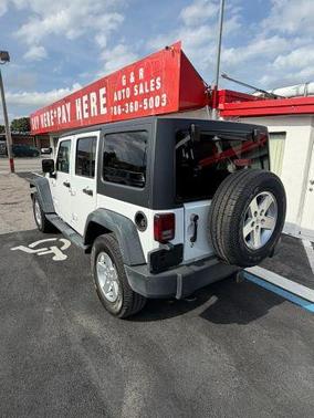 White 2014 Jeep Wrangler Unlimited Sport