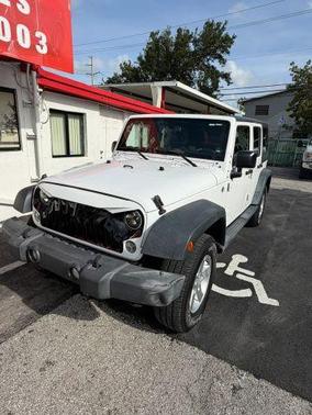 White 2014 Jeep Wrangler Unlimited Sport
