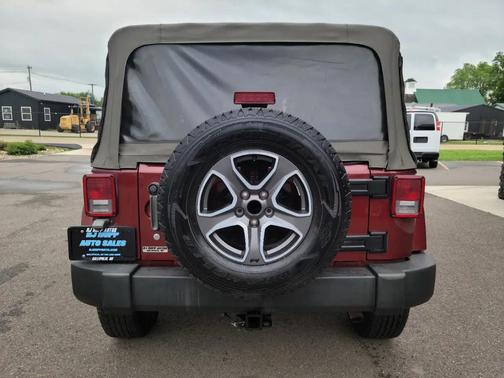 Red 2007 Jeep Wrangler Unlimited Sahara