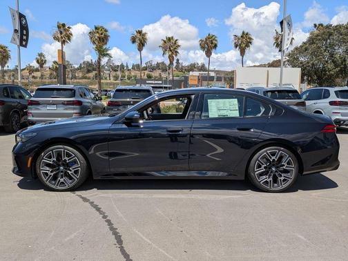 Carbon Black Metallic 2026 BMW 540 i xDrive