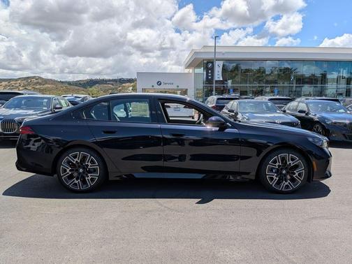 Carbon Black Metallic 2026 BMW 540 i xDrive