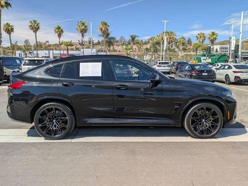 Black Sapphire Metallic 2024 BMW X4 M AWD