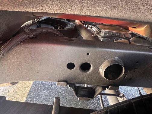 Red 2025 Nissan Frontier SV