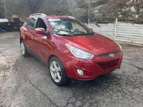 Garnet Red 2013 Hyundai TUCSON GLS