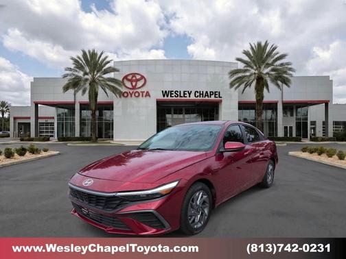Ultimate Red Metallic 2024 Hyundai ELANTRA HEV Blue
