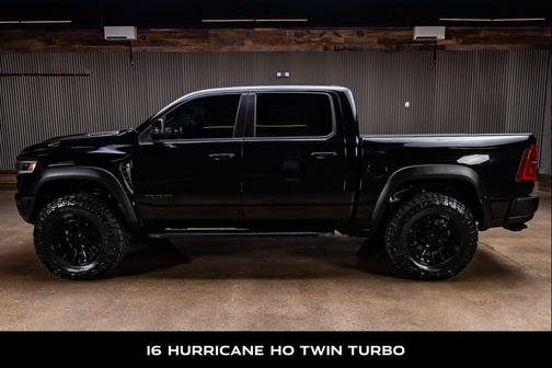 Diamond Black Crystal Pearlcoat 2025 RAM 1500 RHO Crew Cab 4x4 5'7' Box