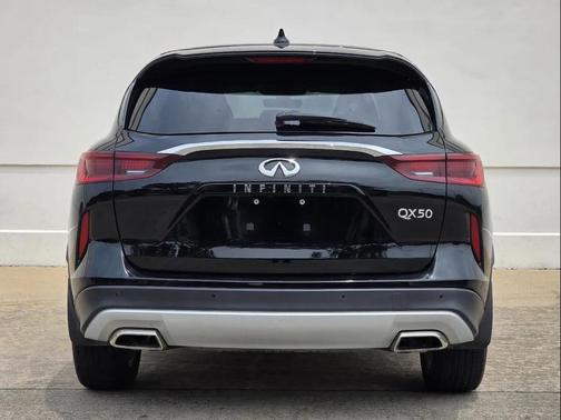 Black Obsidian 2024 INFINITI QX50 PURE