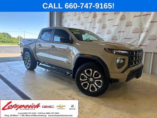Desert Sand Metallic 2024 GMC Canyon AT4