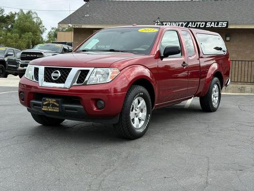 Red 2013 Nissan Frontier SV