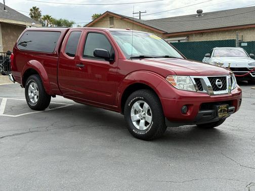 Red 2013 Nissan Frontier SV