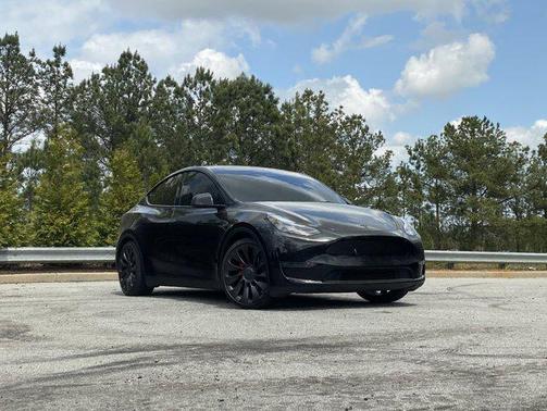 SOLID BLACK [BLACK] 2025 Tesla Model Y Performance Dual Motor All-Wheel Drive