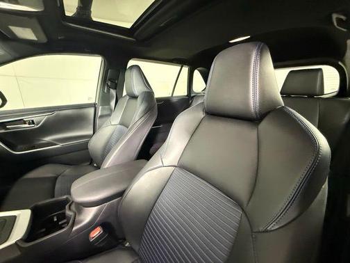 Silver Sky Metallic/Midnight Black Metallic 2024 Toyota RAV4 Hybrid SE