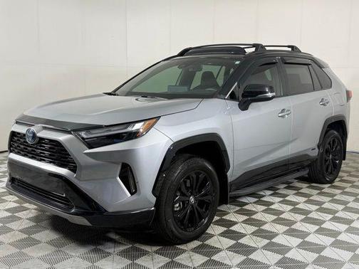 Silver Sky Metallic/Midnight Black Metallic 2024 Toyota RAV4 Hybrid SE