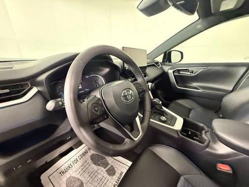 Silver Sky Metallic/Midnight Black Metallic 2024 Toyota RAV4 Hybrid SE