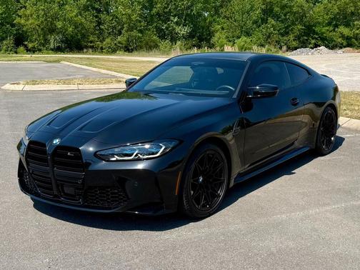 Black Sapphire Metallic 2024 BMW M4 Competition xDrive