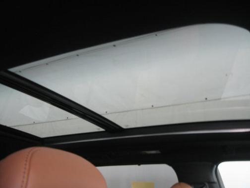 Midnight Black Metallic 2026 Toyota Highlander Hybrid Platinum