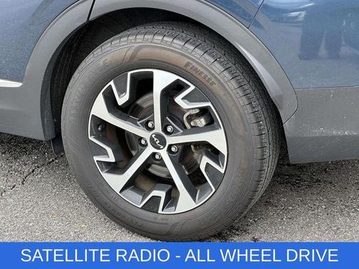 Blue 2024 Kia Sportage Hybrid EX