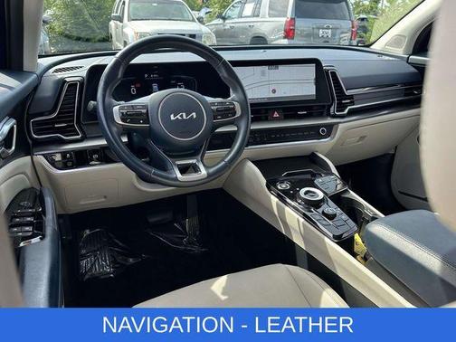 Blue 2024 Kia Sportage Hybrid EX