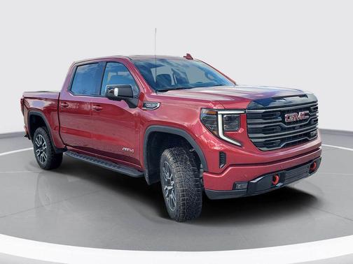Volcanic Red Tintcoat 2026 GMC Sierra 1500 AT4