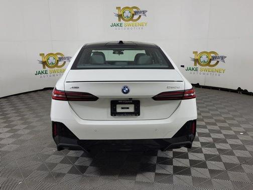 Alpine White 2026 BMW 550e xDrive